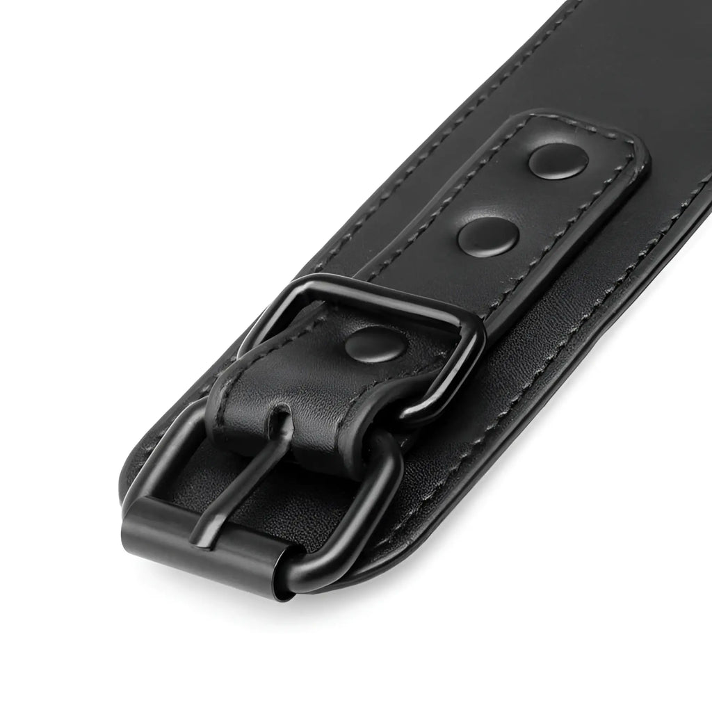 Bedroom fantasies faux leather handcuffs black with black leather belt, matte metal buckle, and reinforced stitching