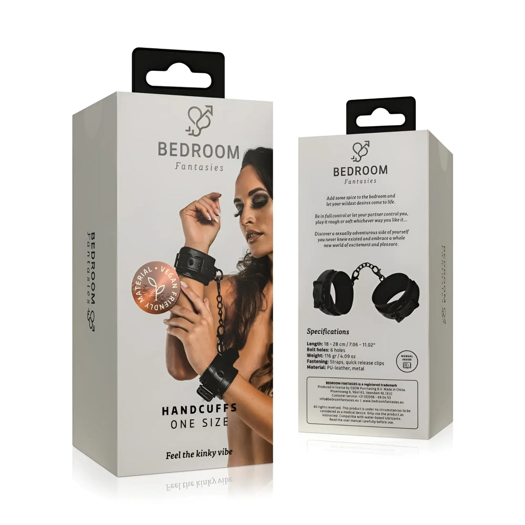 Bedroom Fantasies faux leather handcuffs in black with chain packaged in branded box for bedroom fantasies