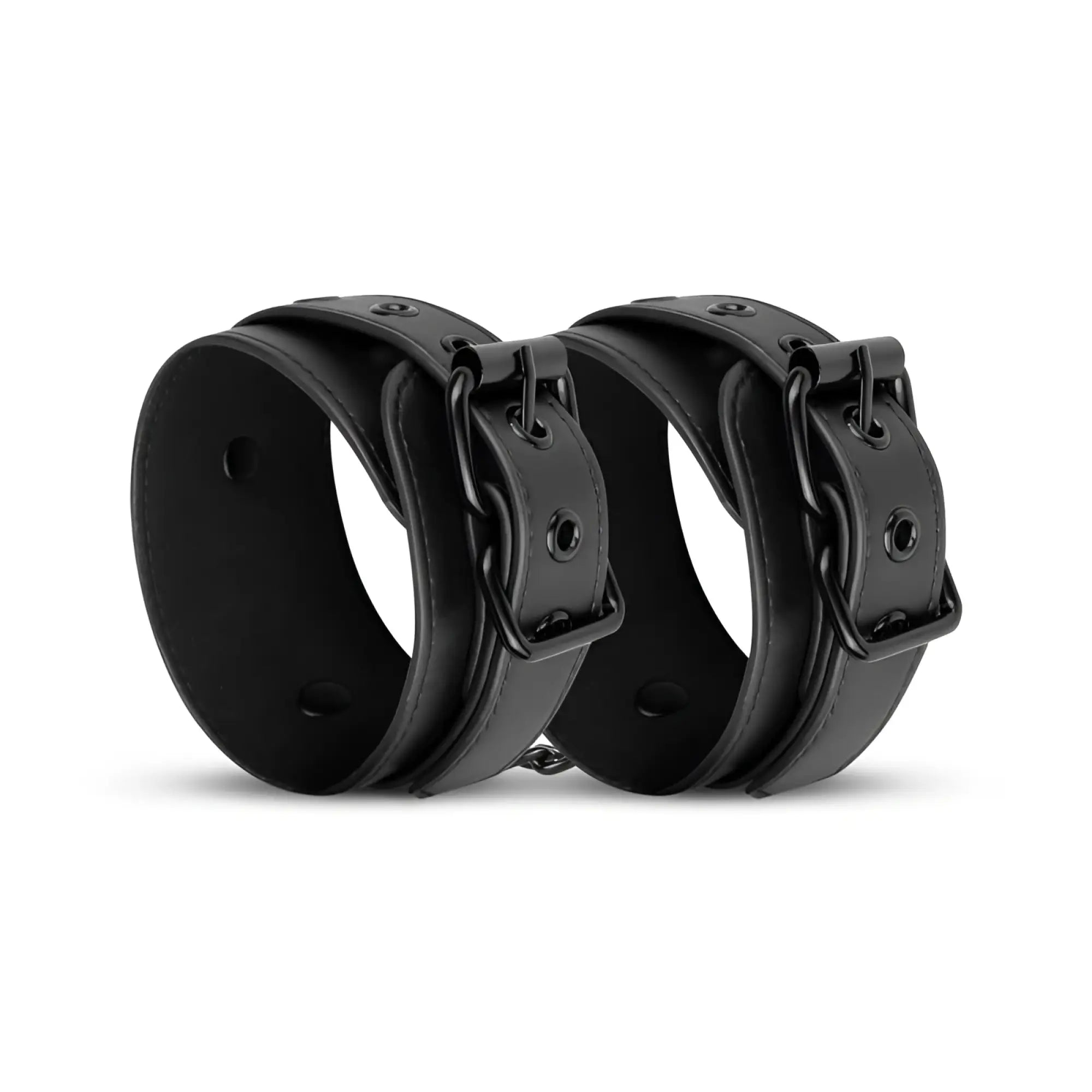 Black leather wrist cuffs with matte finish and metal buckles from bedroom fantasies faux leather handcuffs black