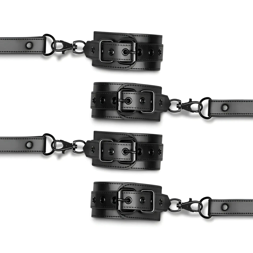 Set of four black leather bedroom fantasies hogtie wrist and ankle cuffs with metal buckles and attached chains