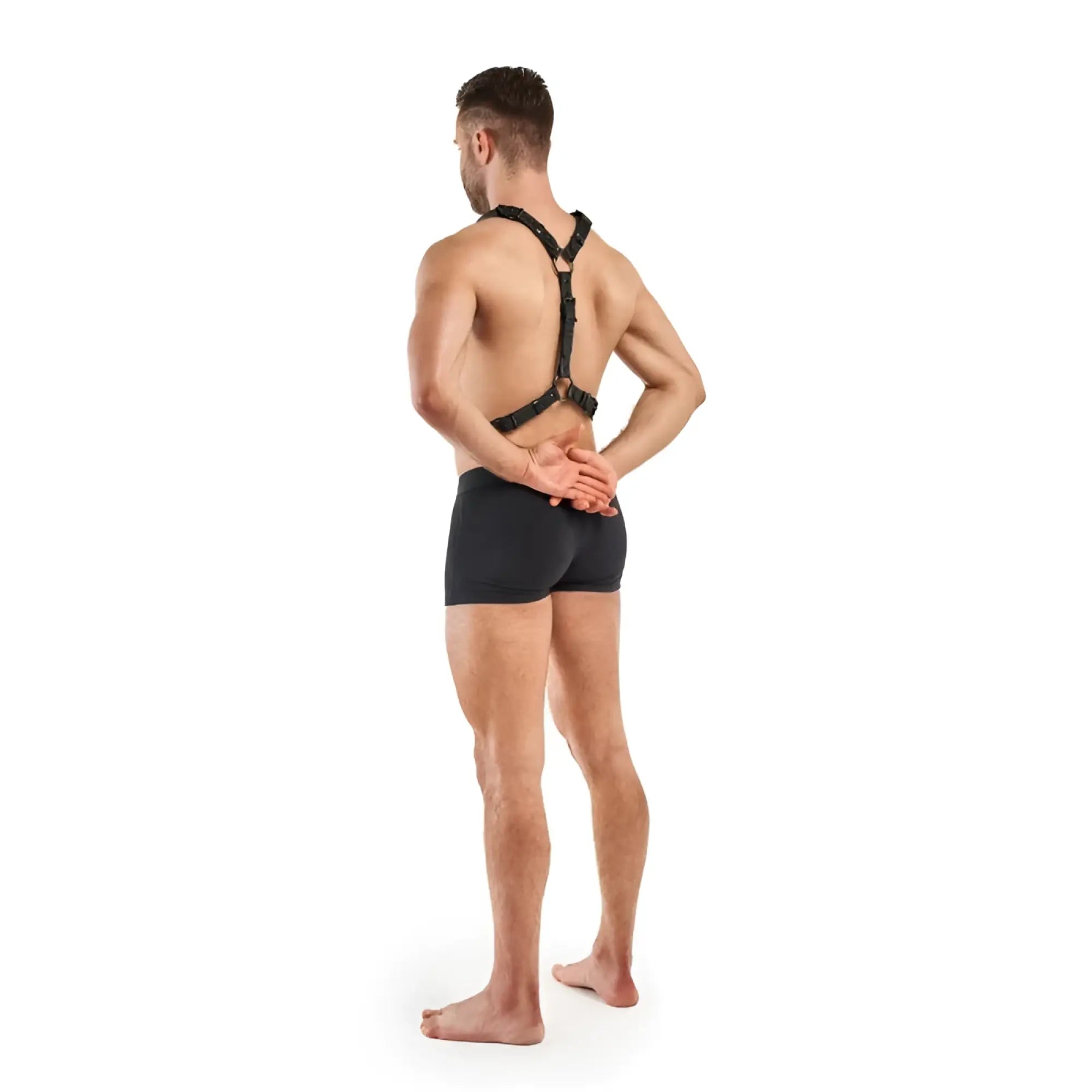 Black leather bedroom fantasies max bondage harness with adjustable straps and metal buckles shown from the back