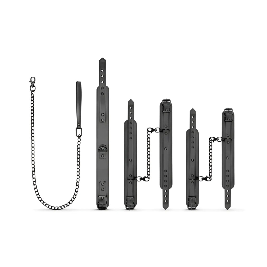 Black leather bondage set with metal chains and adjustable buckles from Bedroom Fantasies total restraint complete set