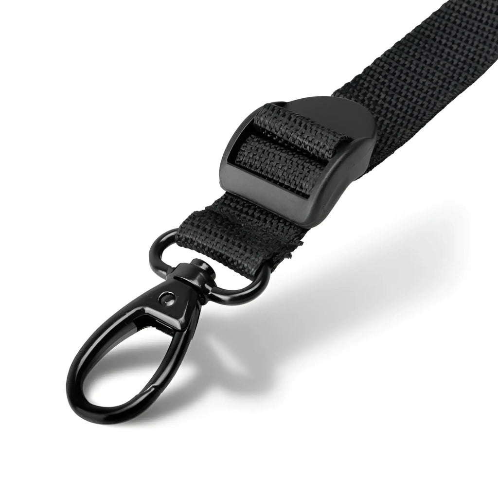 Black nylon strap with plastic buckle and metal swivel hook in bedroom fantasies under the bed restraint bondage set