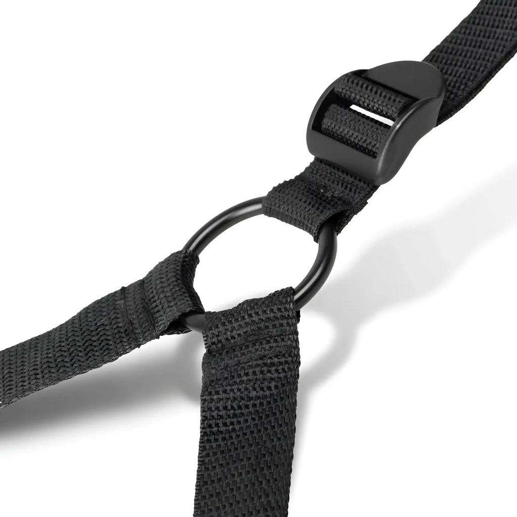 Black woven nylon strap with black plastic buckle and metal ring in bedroom fantasies under the bed restraint set