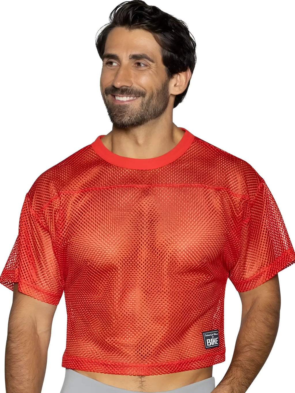 Front view of a model wearing a bright red BIKE Athletic BAM134 short sleeve practice jersey.