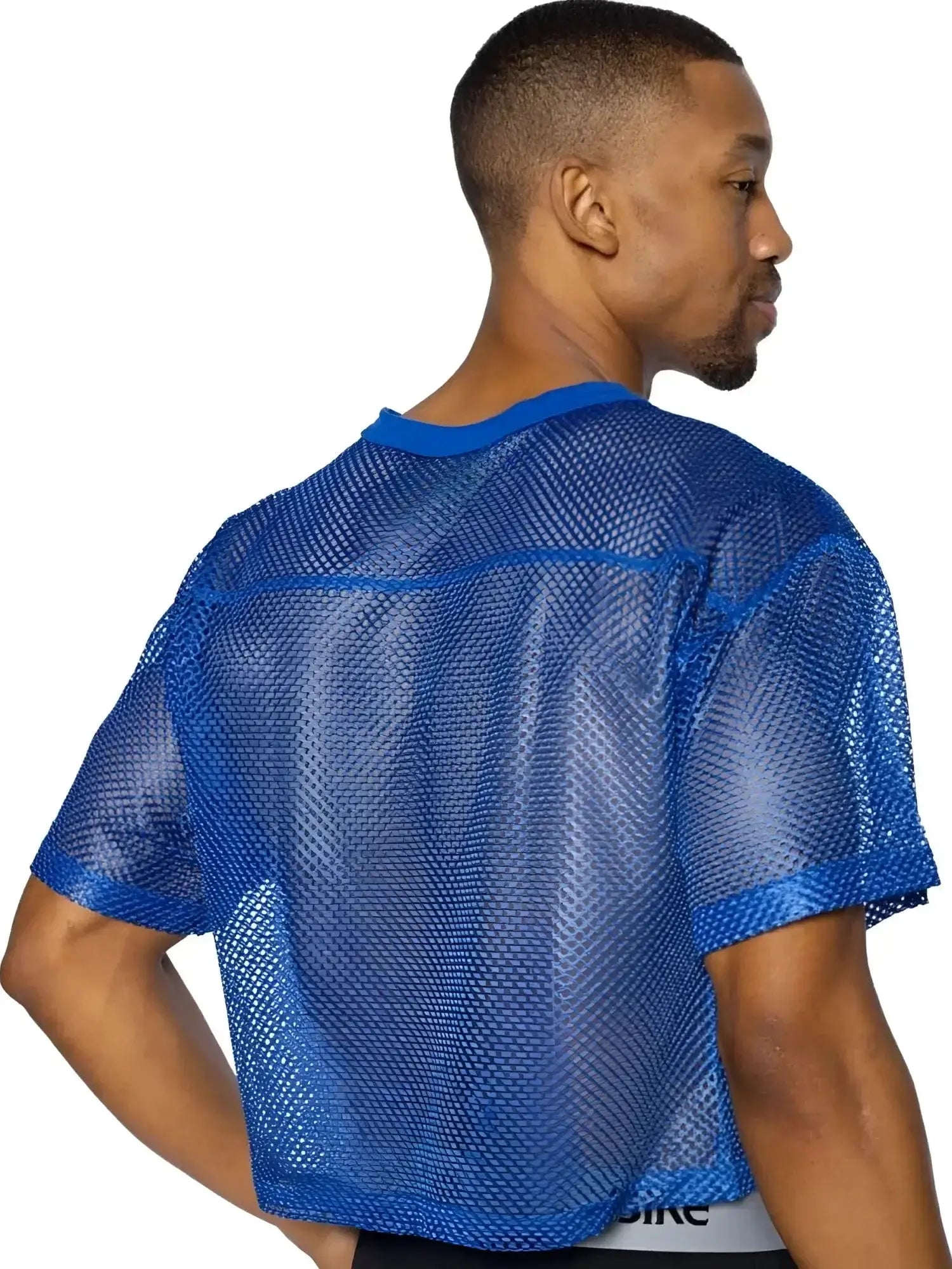 Back view of a male model wearing a royal BIKE Athletic BAM134 short sleeve mesh practice jersey.