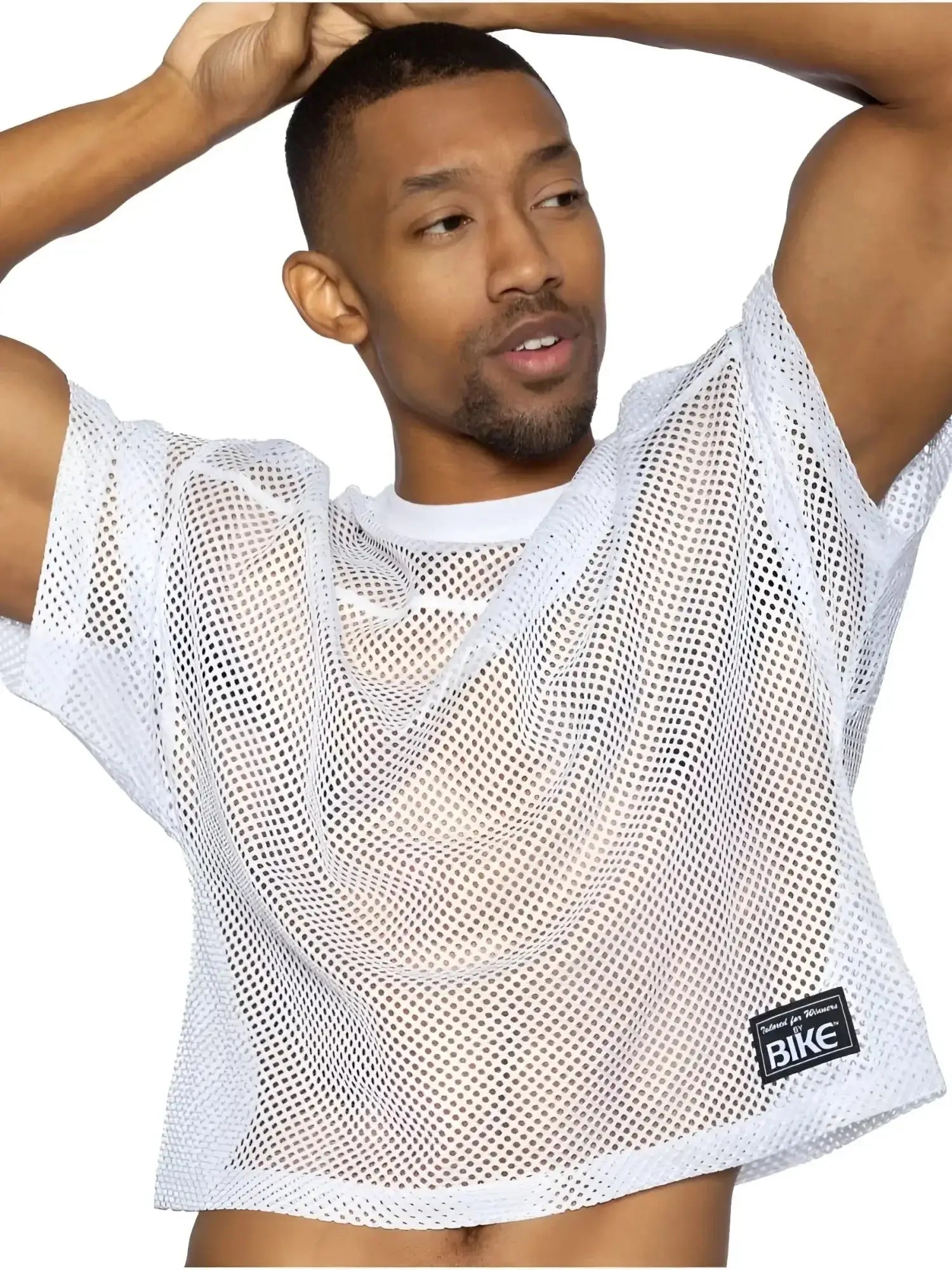 BIKE Athletic BAM134 short sleeve practice jersey in white. Front lifestyle shot of a man wearing the mesh jersey.