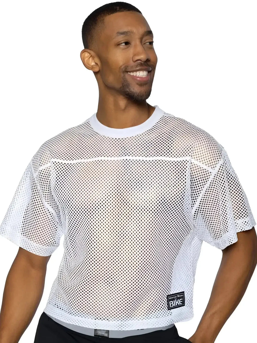 BIKE Athletic BAM134 short sleeve practice jersey in white. Front view showing mesh fabric on a male model.