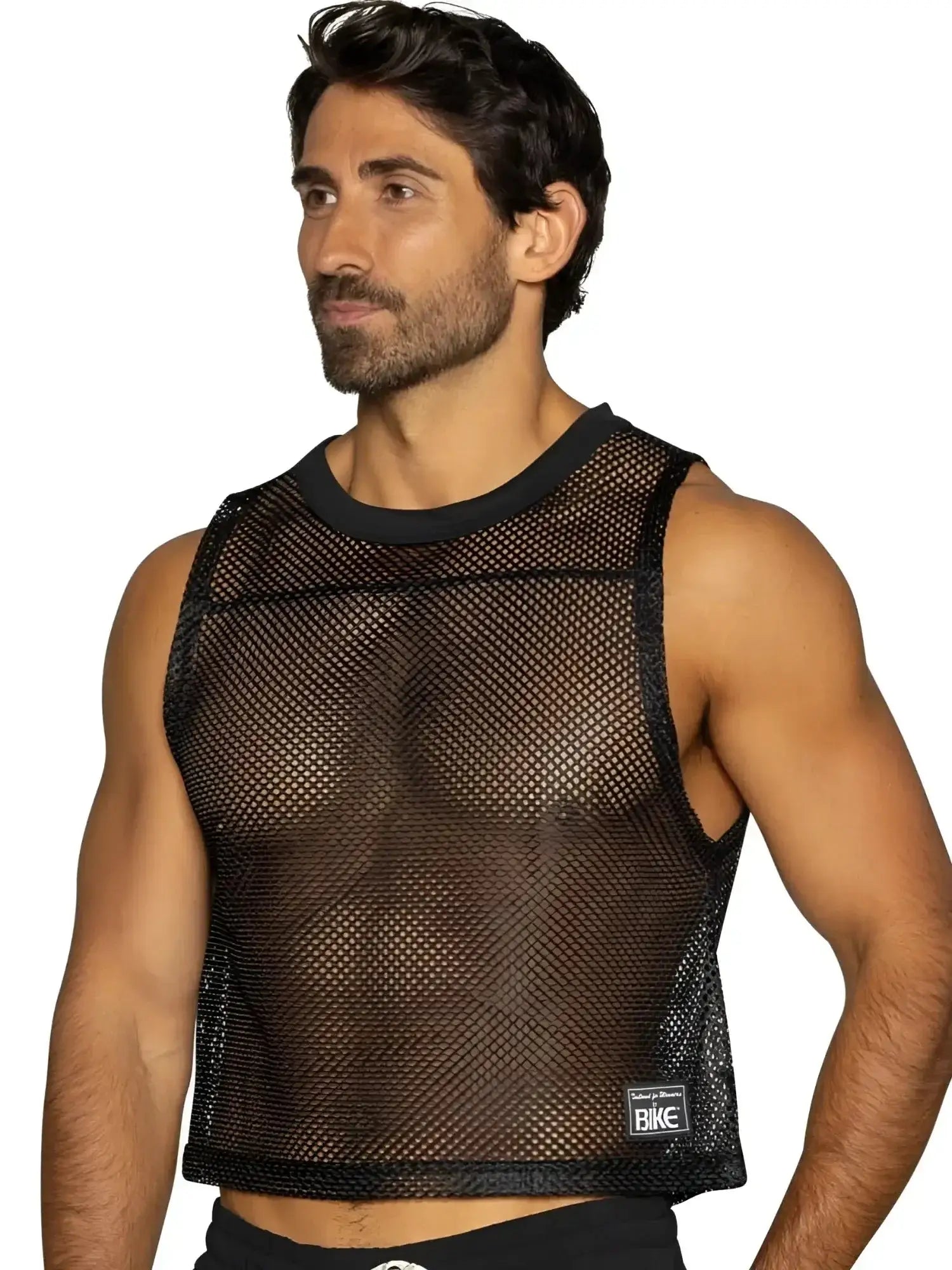 BIKE Athletic BAM135 sleeveless black mesh practice jersey, lifestyle shot of a man wearing the tank top.