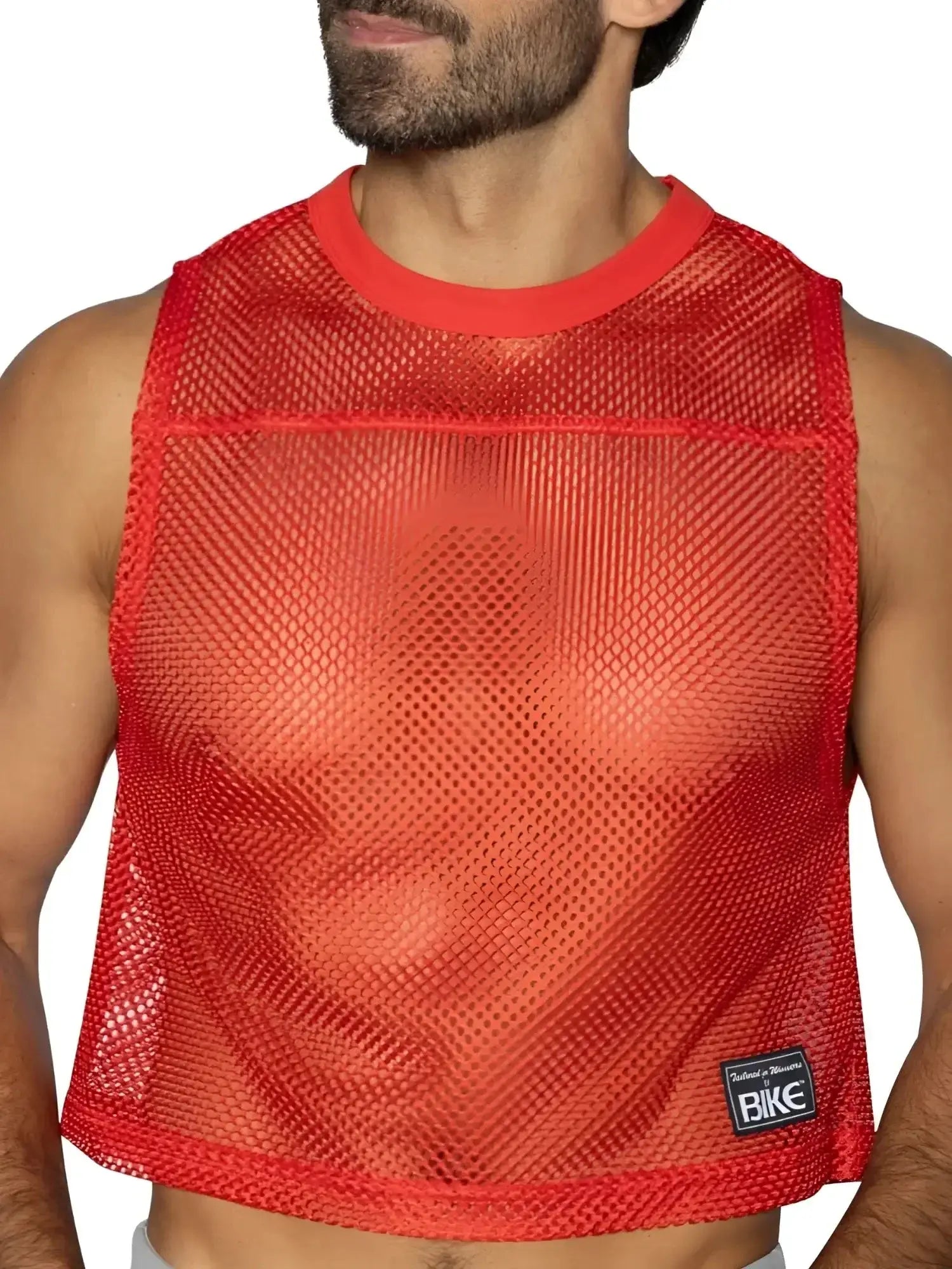Front view of a man wearing a red BIKE Athletic BAM135 sleeveless mesh practice jersey.