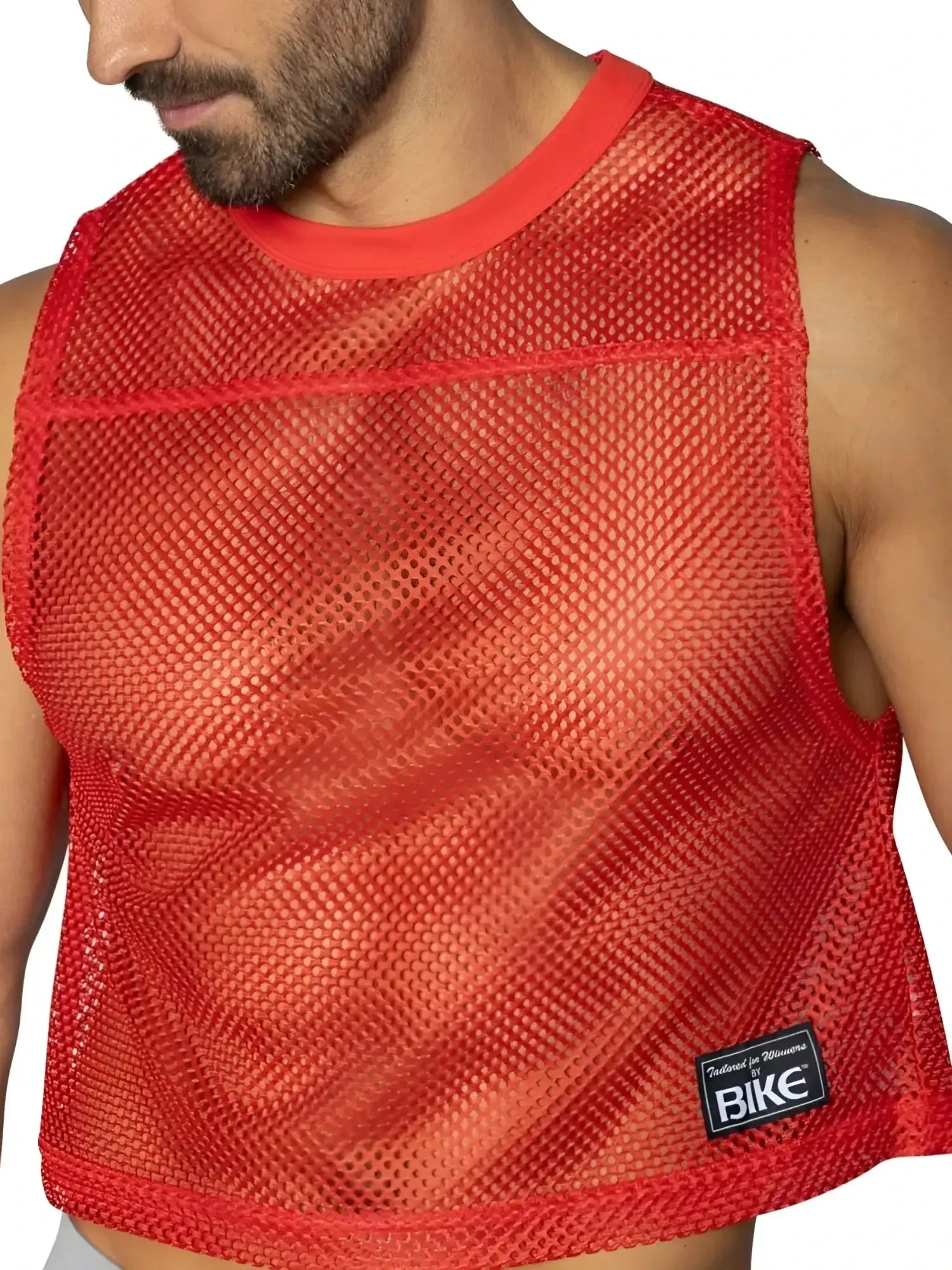 BIKE Athletic BAM135 red sleeveless mesh practice jersey in a front-view product shot on a model.