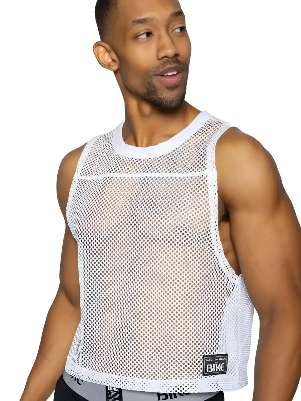 BIKE Athletic BAM135 sleeveless mesh practice jersey in white, modeled in a studio view.