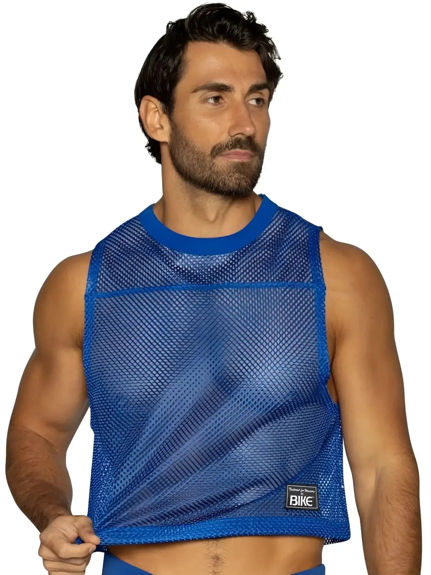 Front view of a man wearing a BIKE Athletic BAM135 mesh sleeveless practice jersey in royal blue.