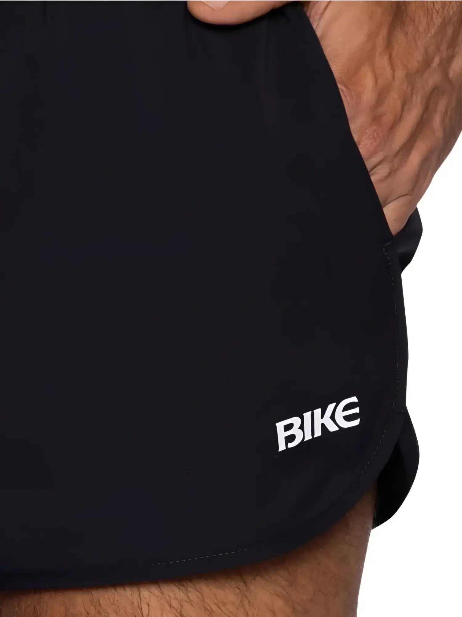 Detail shot of black BIKE Athletic BAM200 track shorts with white logo.
