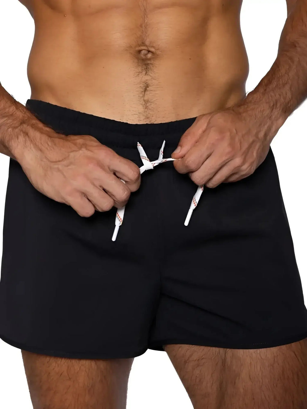 BIKE Athletic BAM200 track shorts in black. Front detail view of a person tying the drawstring waist.