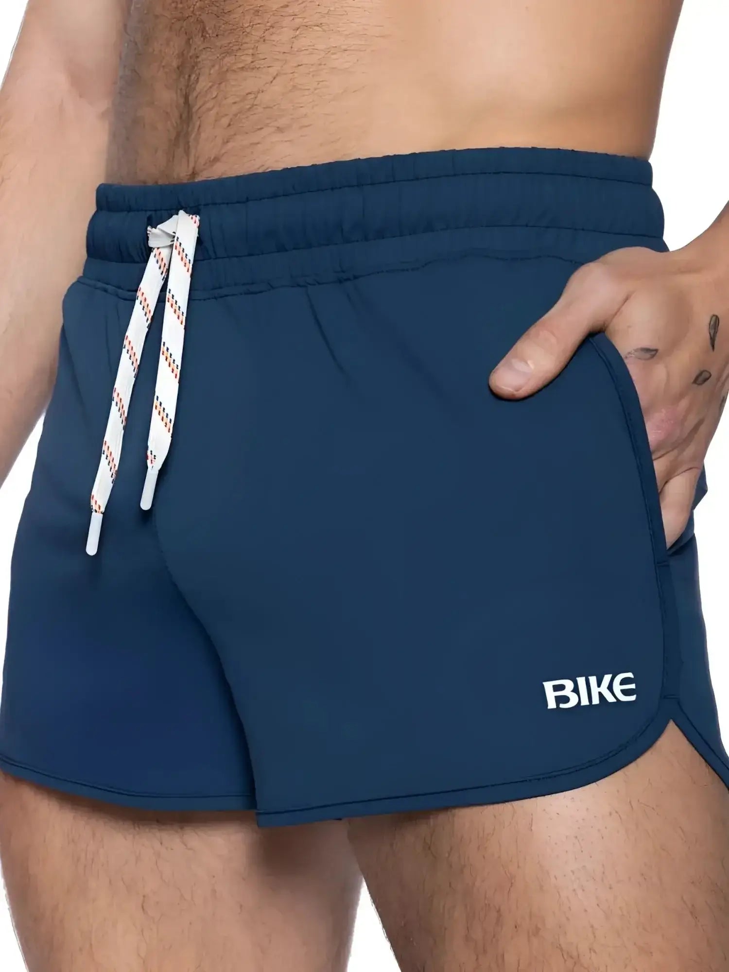 BIKE Athletic BAM200 track short in navy, close-up lifestyle shot showing the waistband, drawstring, and logo.