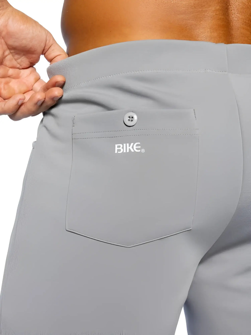 Detail view of the gray BIKE Athletic BAM207 Coaches Short, showing the back pocket with button.