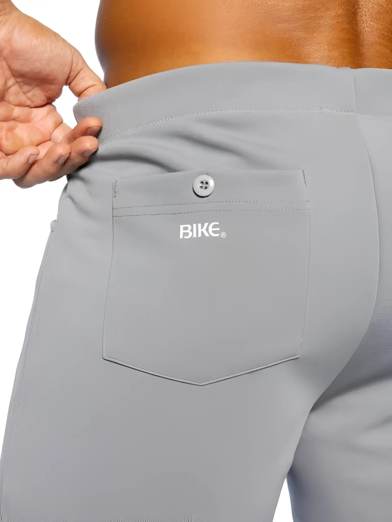 Detail view of the gray BIKE Athletic BAM207 Coaches Short, showing the back pocket with button.