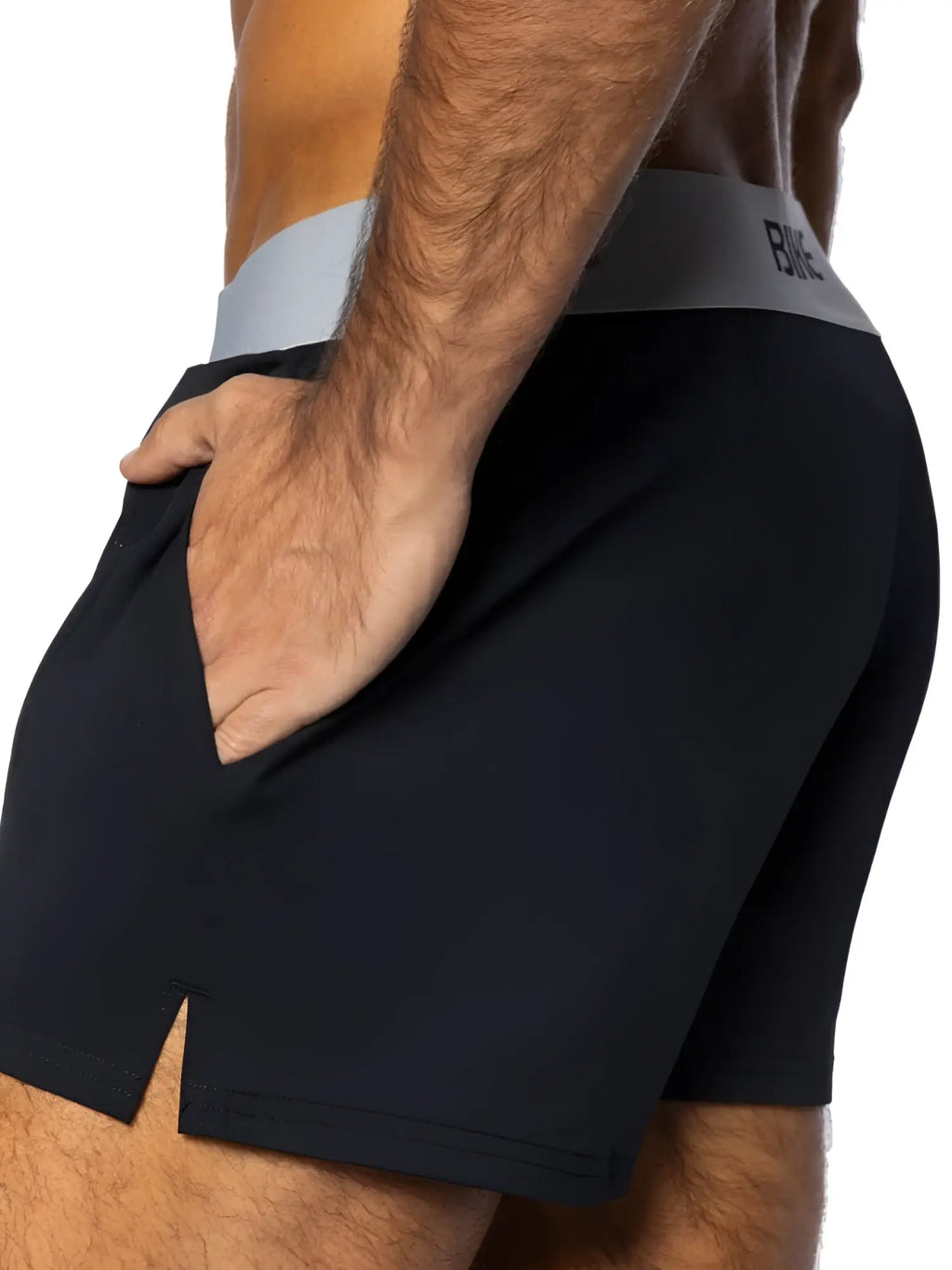 BIKE Athletic BAM216 Jock Short in black, side view lifestyle shot showing the waistband and pocket detail.