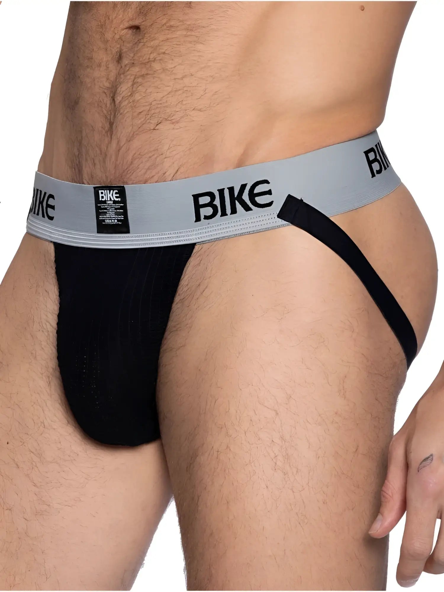 Front view of BIKE Athletic BAS303 Classic jockstrap in black with a grey branded waistband on a male model.