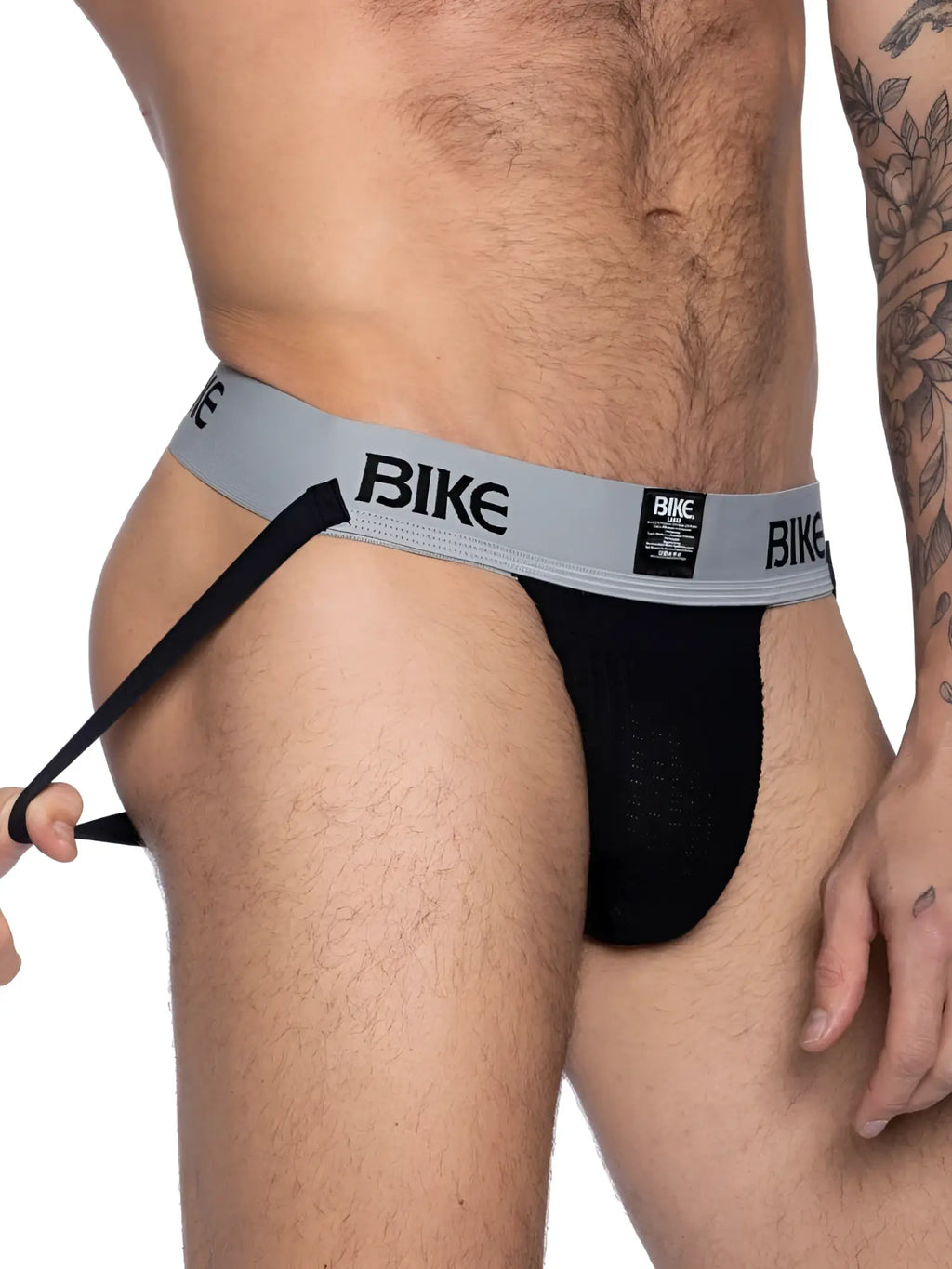 BIKE Athletic BAS303 Classic Jockstrap in black. Side view showing the elastic strap and logo waistband.