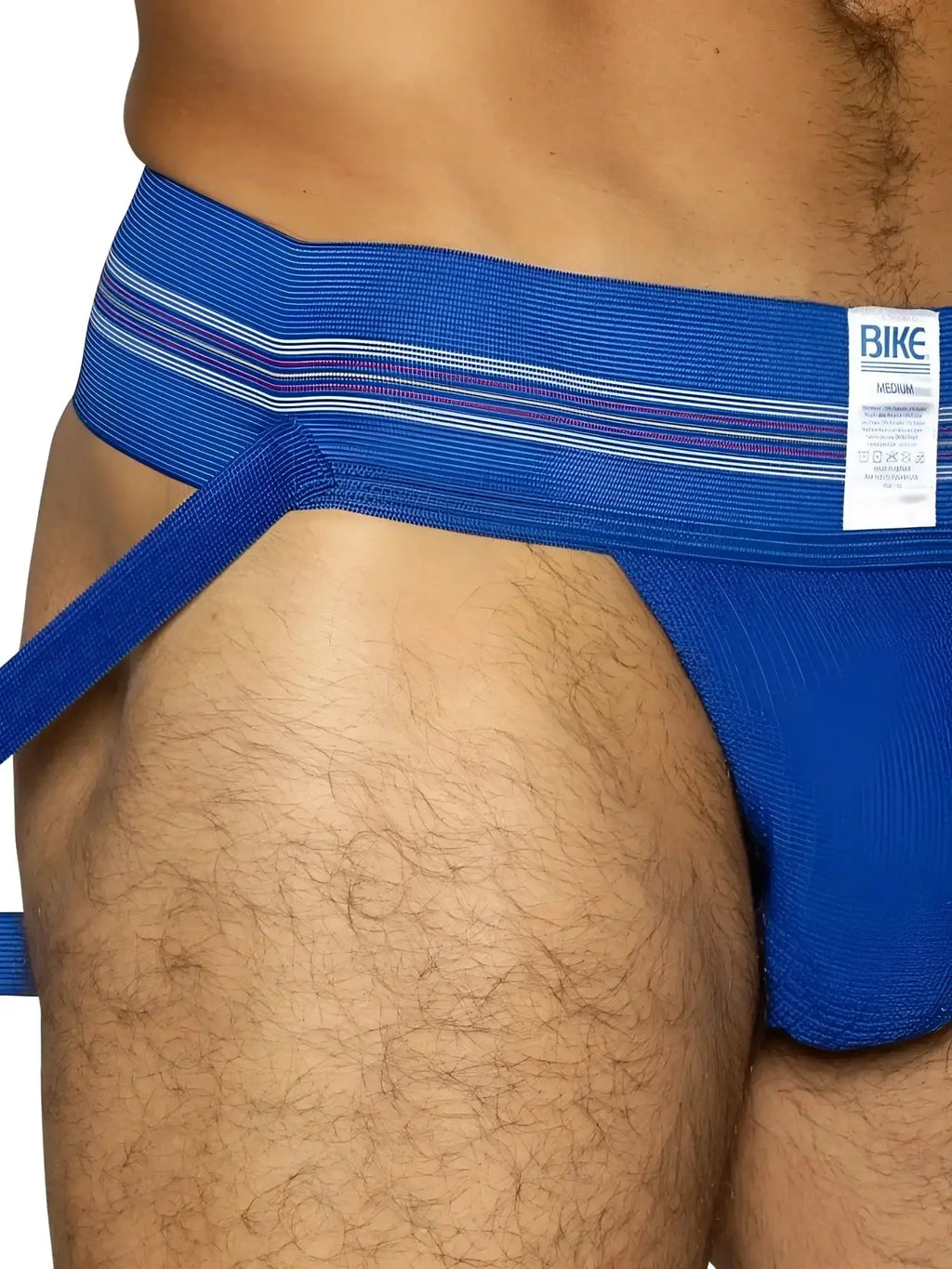 Close-up side view of a royal blue BIKE Athletic BAS306 Original Number 10 jockstrap worn on a model.