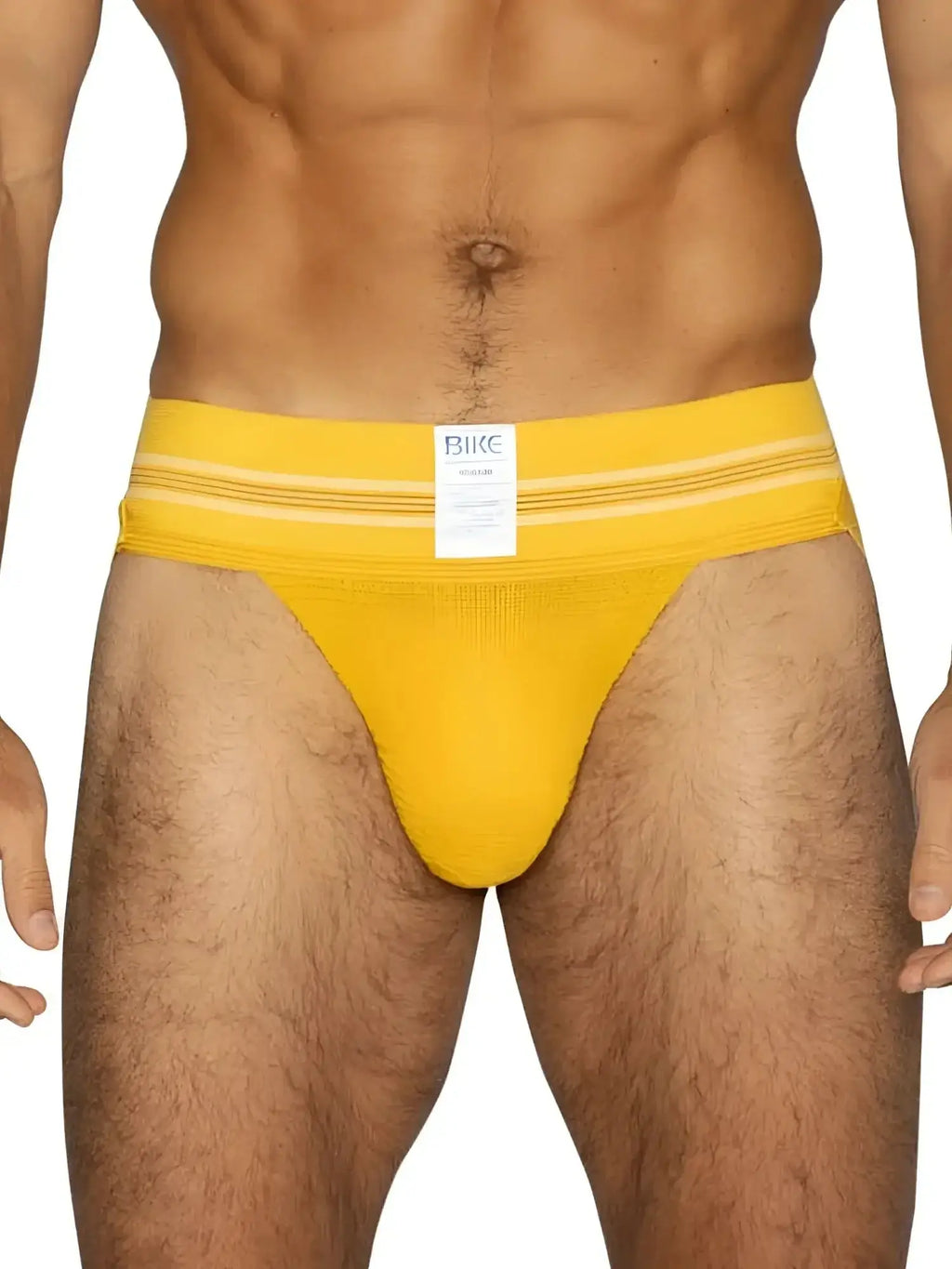Front view of a yellow BIKE Athletic BAS306 Original Number 10 jockstrap worn by a man.