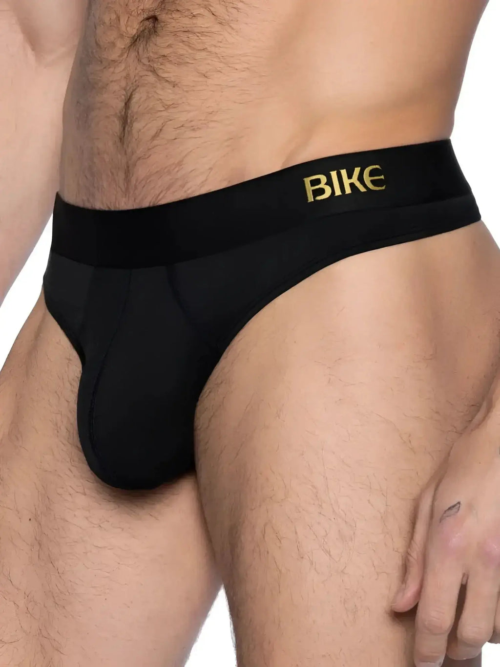 Front view of the black BIKE Athletic BAS319 Active Thong on a male model.