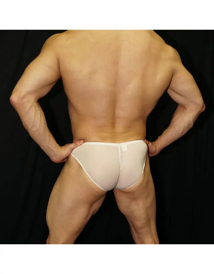 Arroyman men's bikini underwear in cream featuring a snug fit and minimal coverage shown on a model from the back.