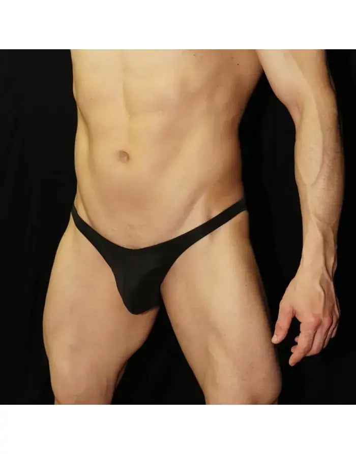 Black eco-leather bikini underwear by Arroyman featuring a minimal design and a snug fit shown on a model.