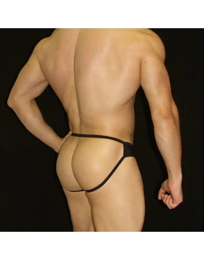 Black half bikini jockstrap underwear by Arroyman featuring a minimal design and elastic waistband shown on a model from the back.