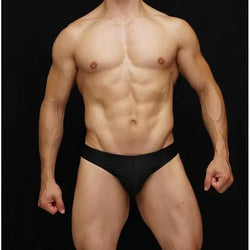 Men's black bikini swimwear by Arroyman featuring a sleek design and minimal coverage modeled on a male figure.