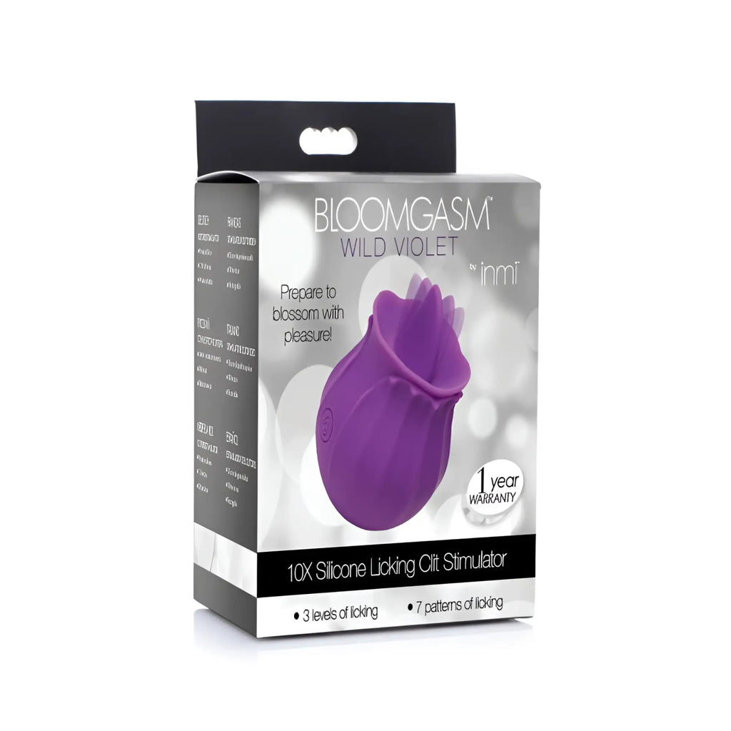 Purple silicone flower-shaped clit stimulator in packaging from bloomgasm wild violet 10x licking product line