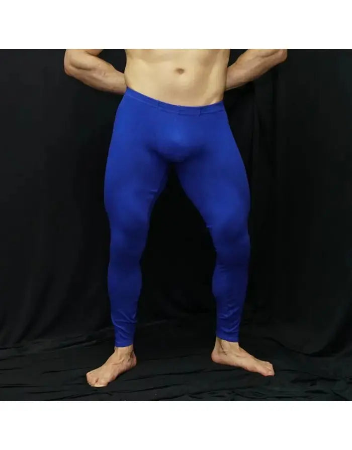 Men's blue spandex tights by Arroyman featuring a form-fitting design and smooth texture shown on a model.