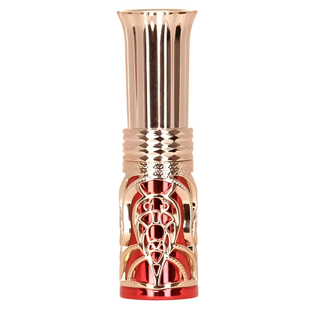 A rose gold bms ruby kiss 4 in 1 lipstick vibrator with intricate cut-out detailing and red interior featuring ysl logo