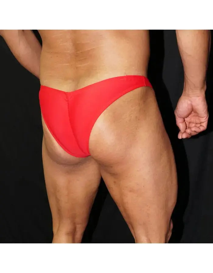 Red bodybuilding posing suit by Arroyman featuring a minimal cut and smooth fabric shown from the back on a model.