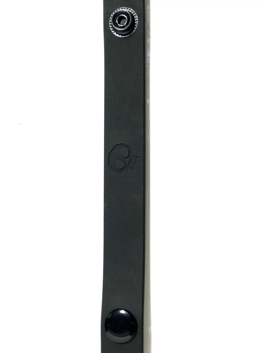 Black leather boneyard silicone cock strap with embossed skull design silver snap button and black circular clasp