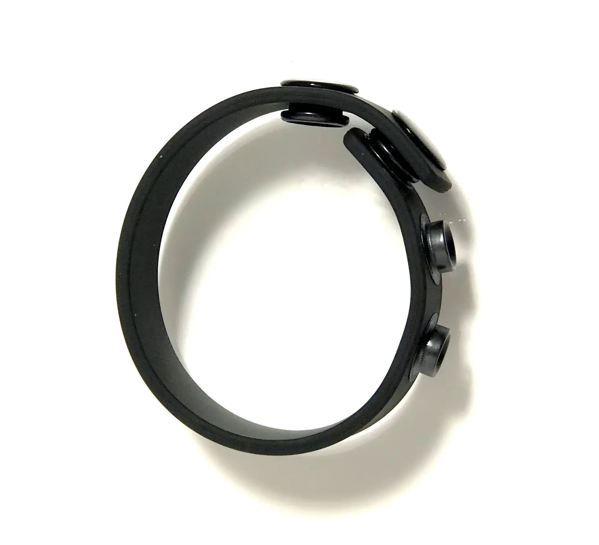 Black silicone wristband with 3 snap closures from boneyard boneyard silicone cock strap for secure fit and comfort
