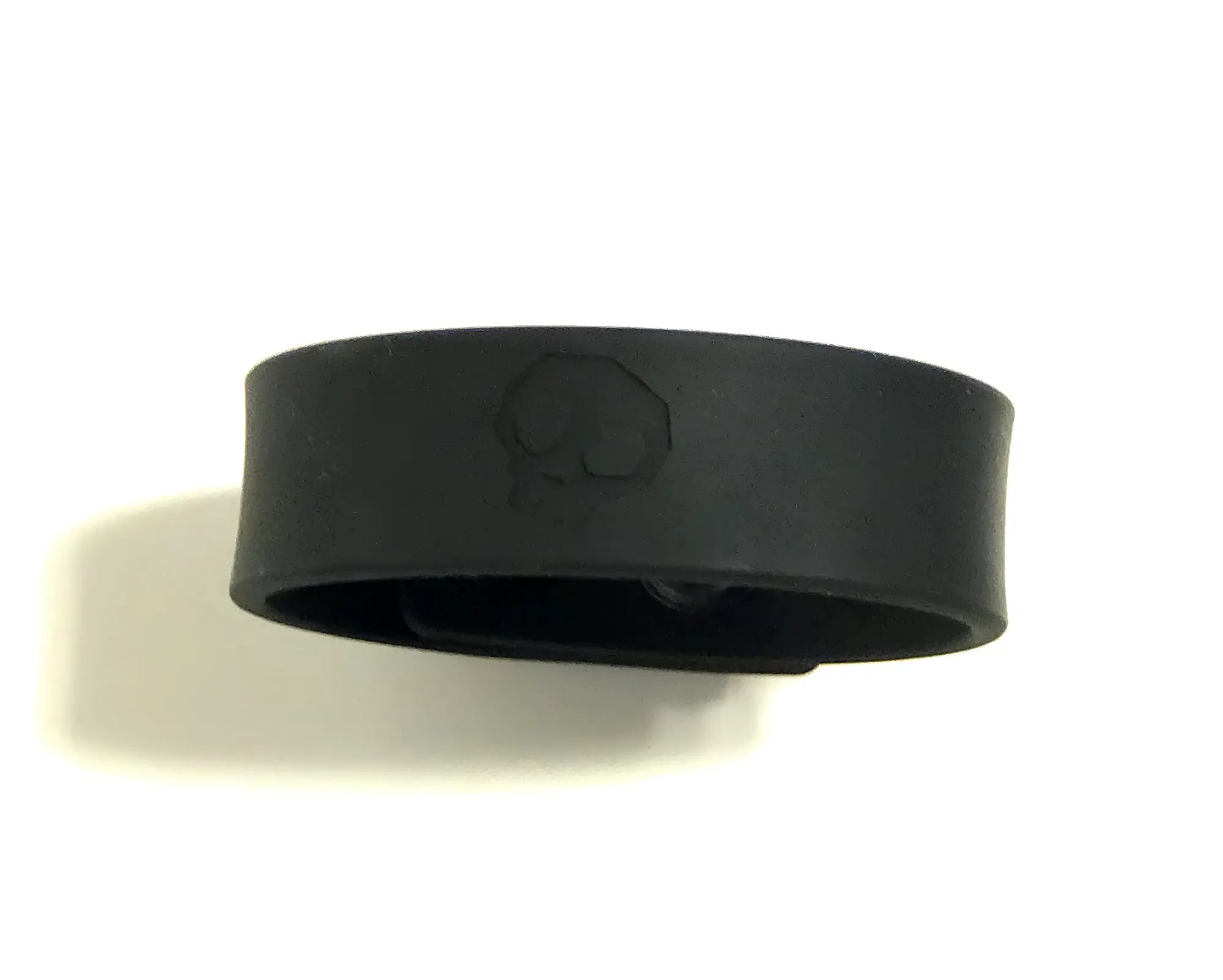 Black silicone wristband with embossed skull design for boneyard silicone cock strap with 3 snap ring in black
