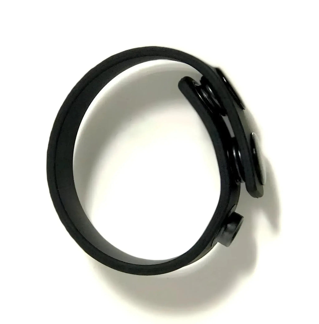 Black silicone wristband cock strap by Boneyard Boneyard with a sleek minimalist design and adjustable clasp mechanism