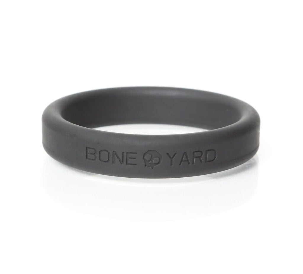 Black silicone boneyard ring with bone yard engraving inside shown from the back in 5 pc kit