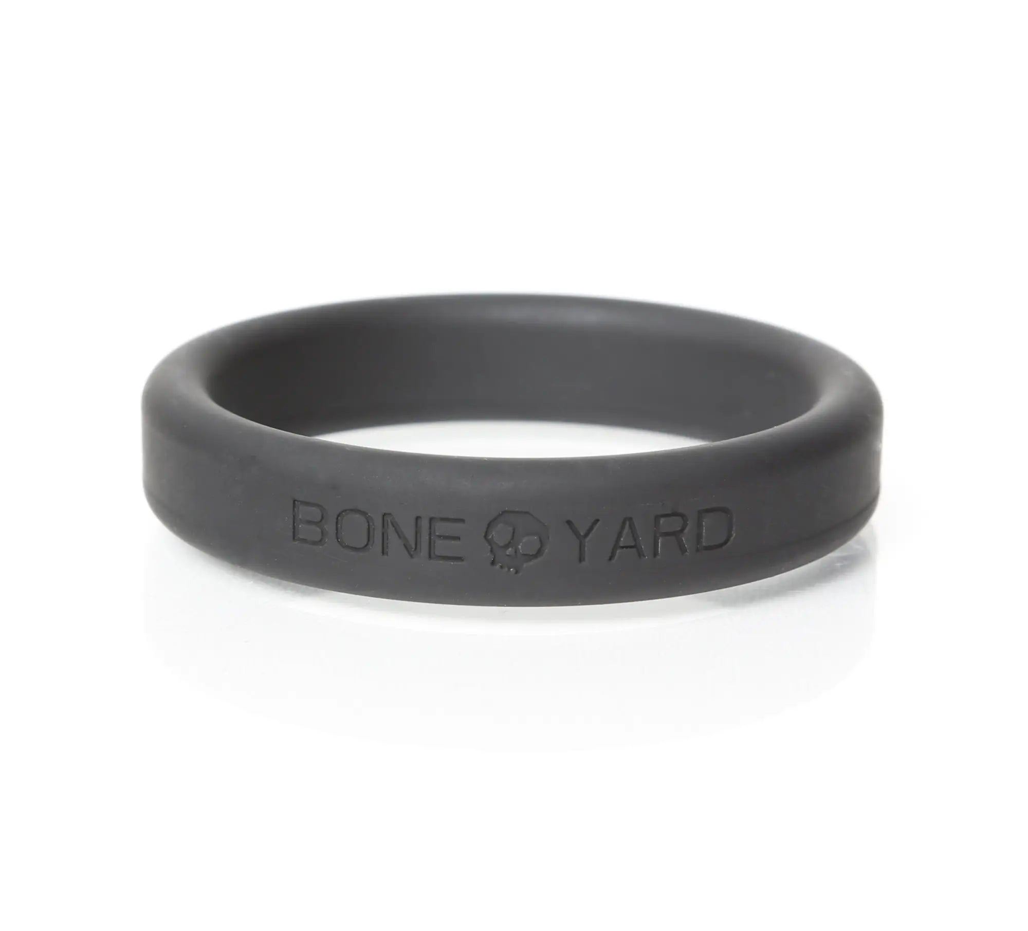 Black silicone boneyard ring with bone yard engraving inside shown from the back in 5 pc kit