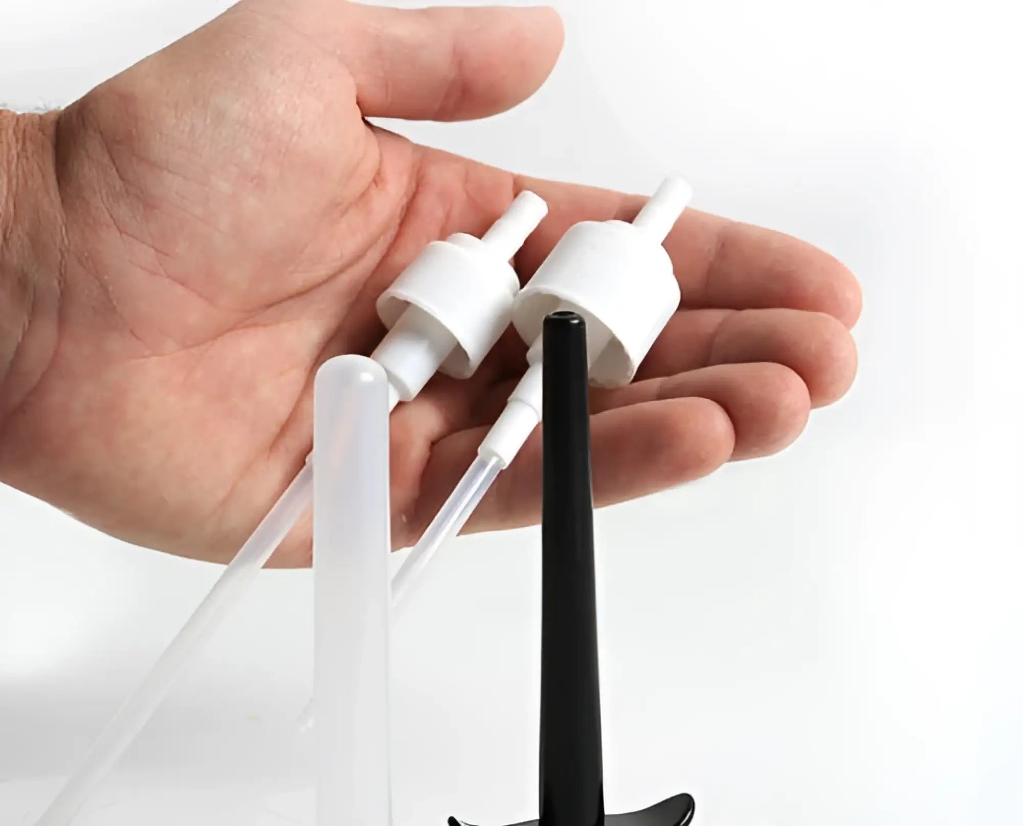 White and black plastic spray pump nozzles with clear tubes for boneyard skwert lube injector