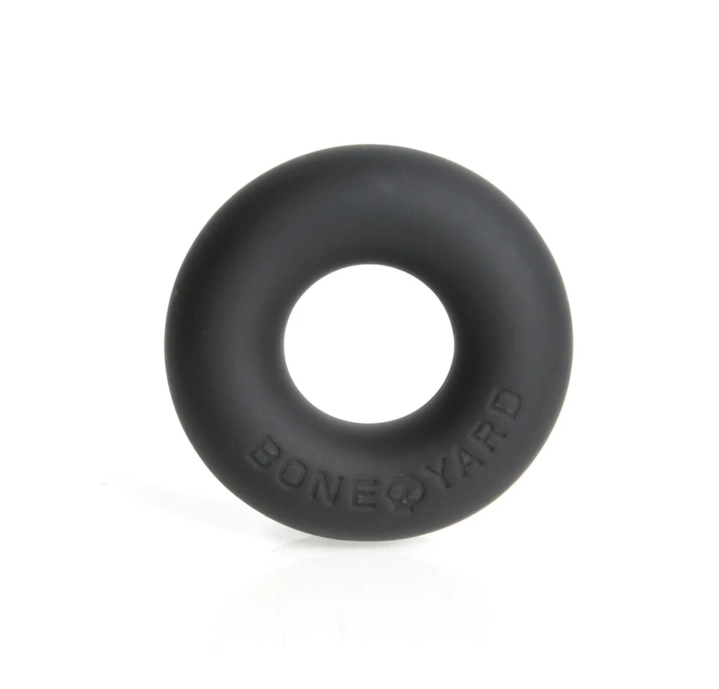 Black silicone cock ring with bone yard embossed on the side from boneyard ultimate collection