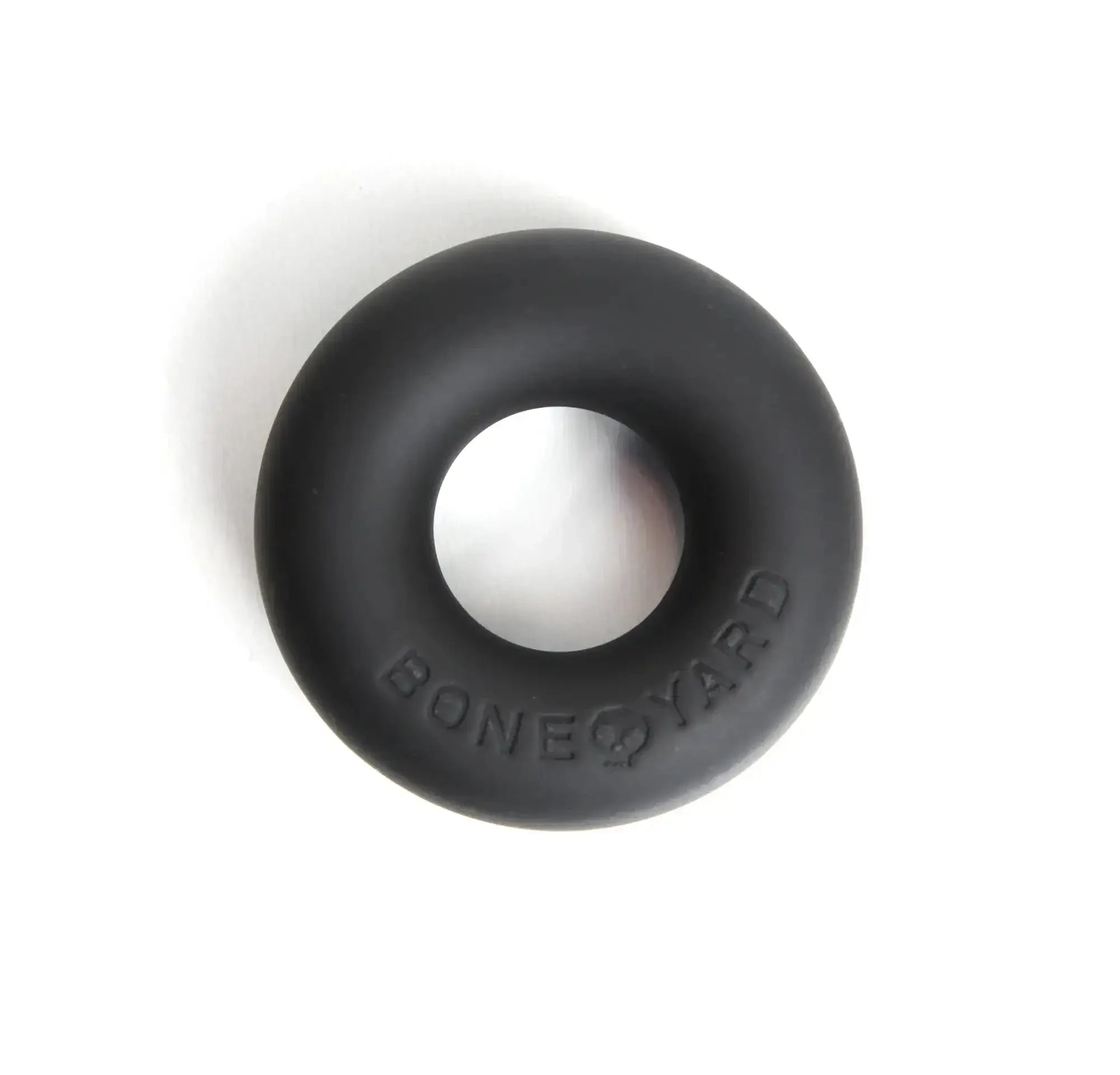 Black silicone cock ring with bone yard embossed detail designed for comfort and durability