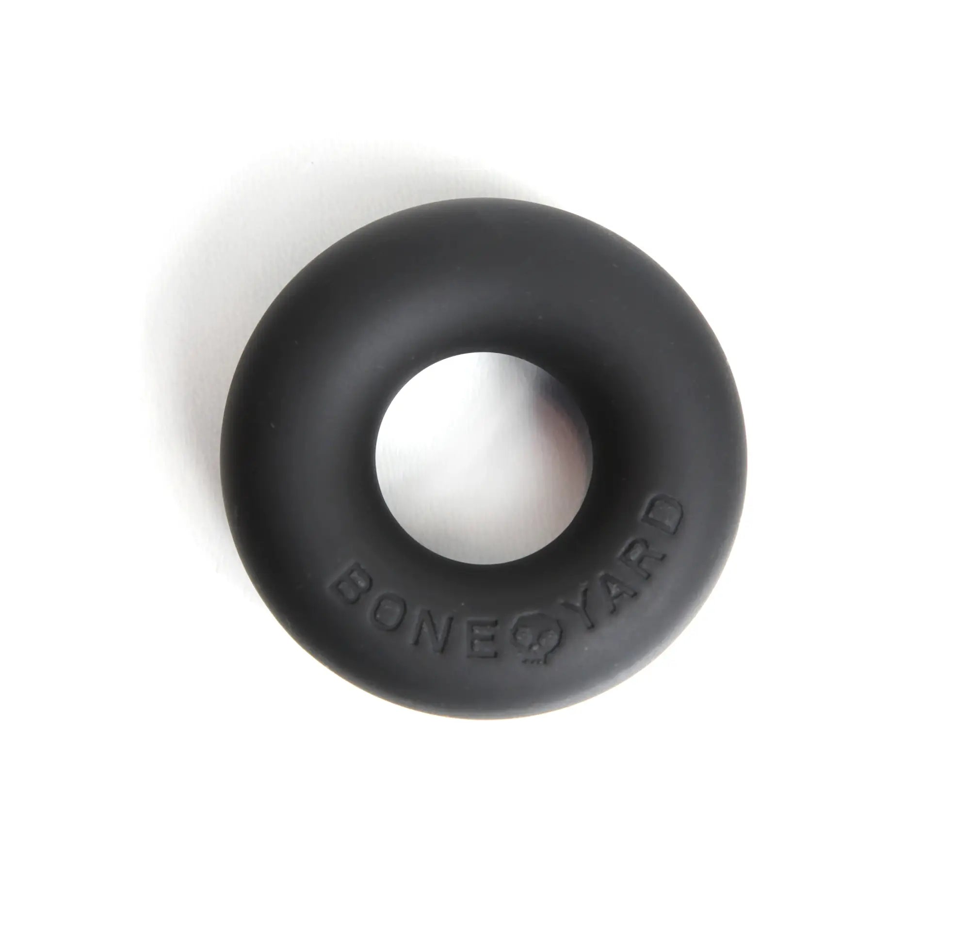 Black silicone cock ring with bone yard embossed detail designed for comfort and durability