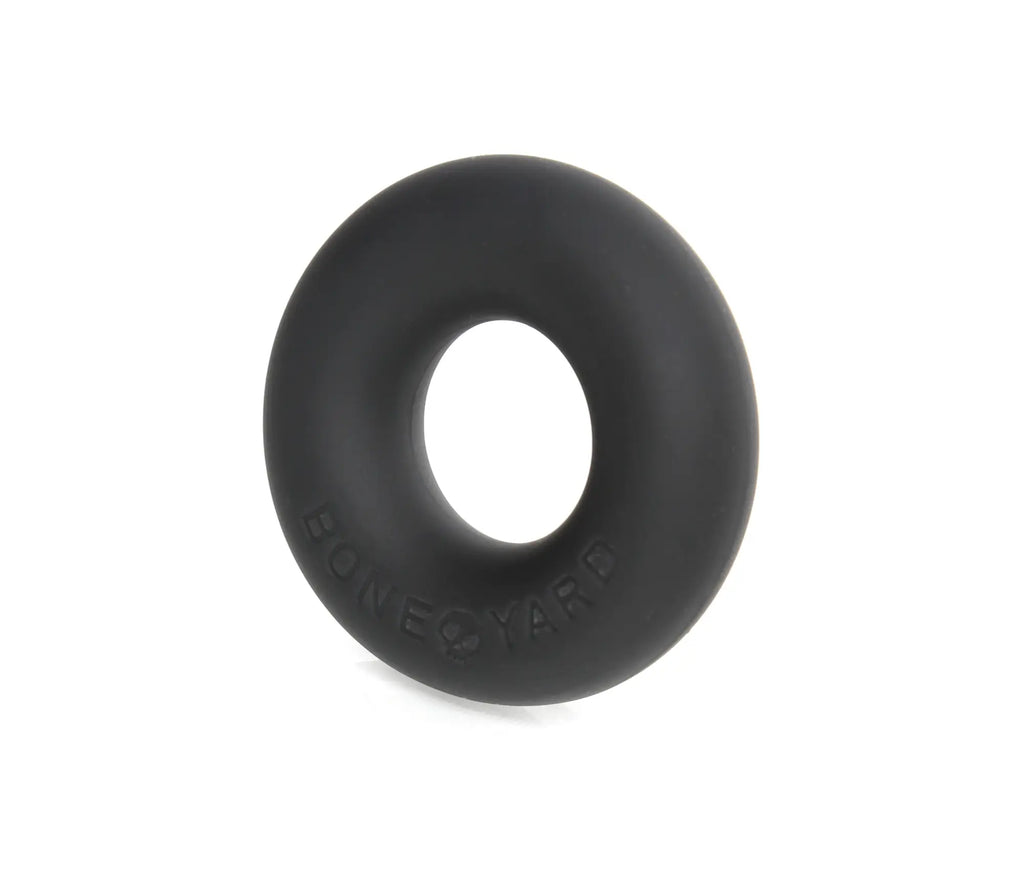 Black silicone cock ring with boneyard embossed on the side for ultimate comfort and durability