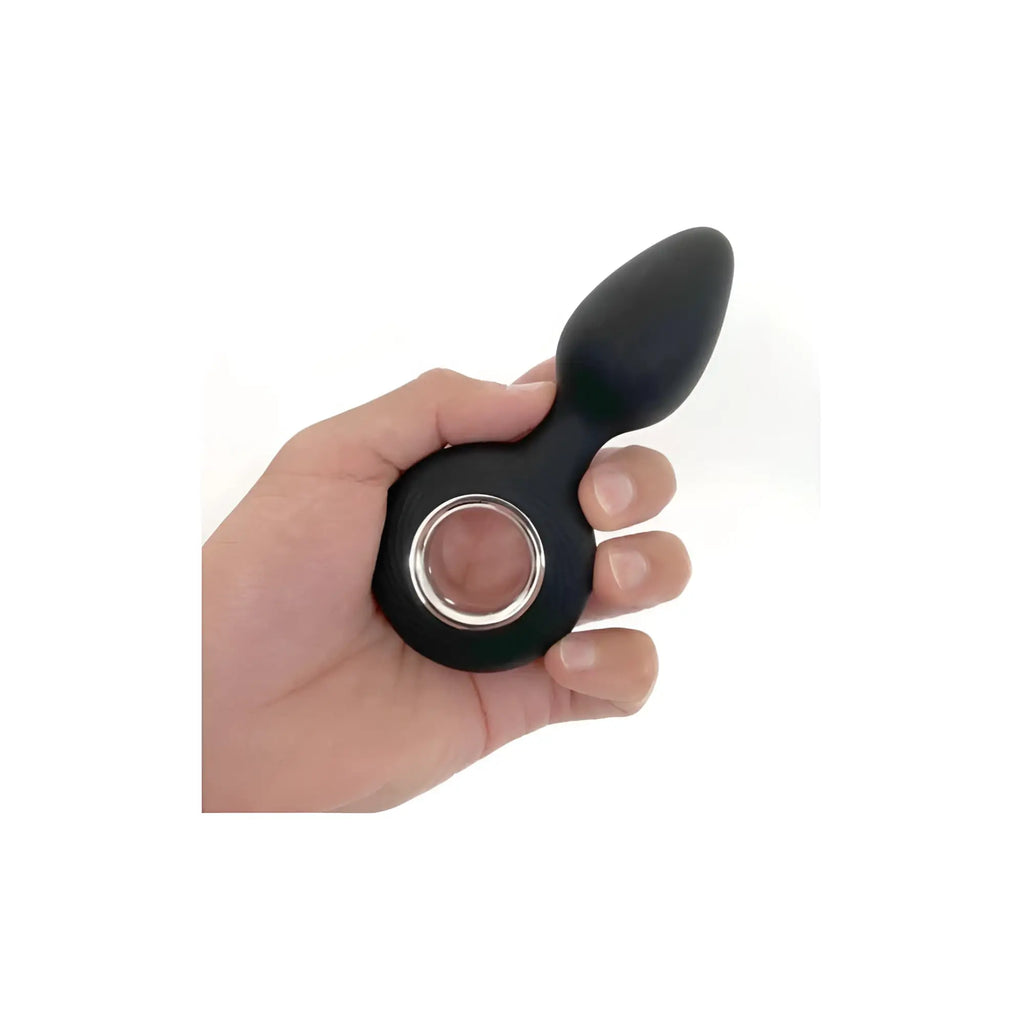 Black silicone anal plug with silver metallic ring base boneyard vers 12 mode usb anal vibrator shown from back side