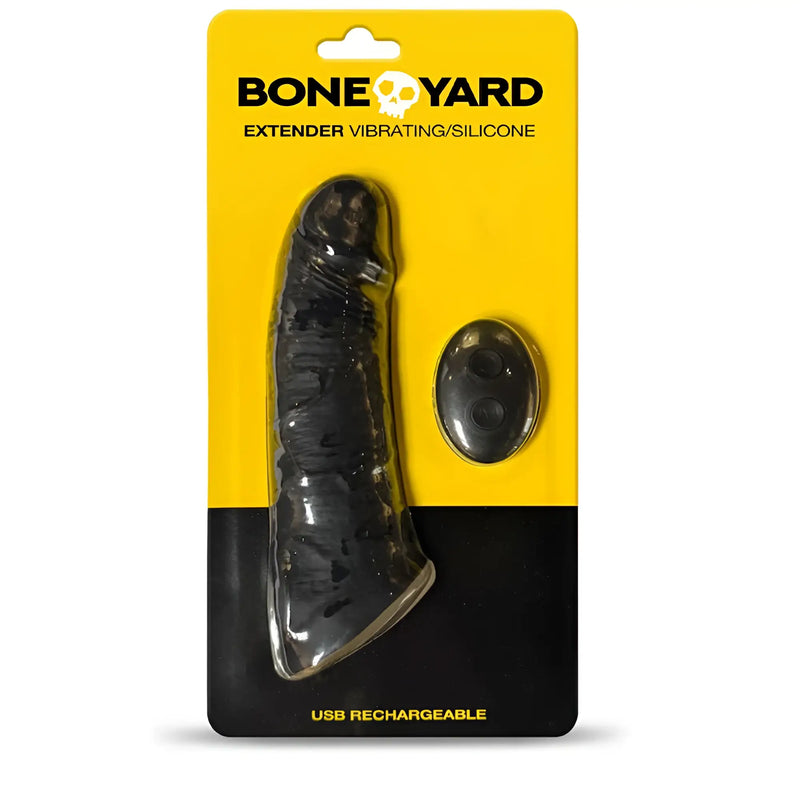 Black silicone vibrating extender with remote control packaged in yellow and black boneyard branded card