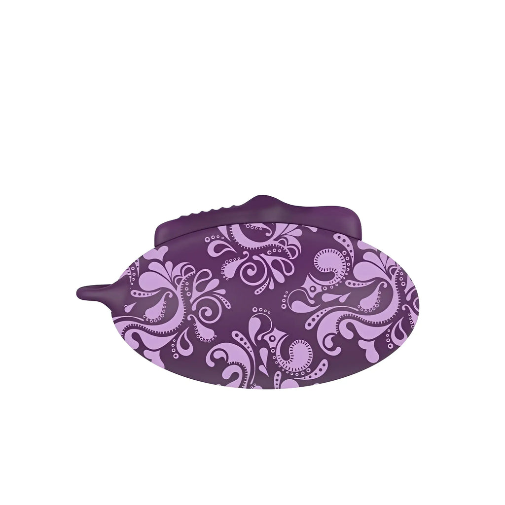 Purple clamshell-style wallet with light purple floral swirl pattern featured in bouncy bliss flow inflatable massager product